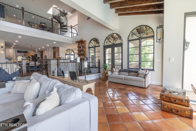 8719 Inlet Dr, Knoxville, TN 37922 - tiled living area featuring a high ceiling, beamed ceiling, and baseboards