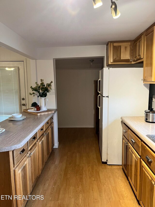 kitchen with light wood-type flooring