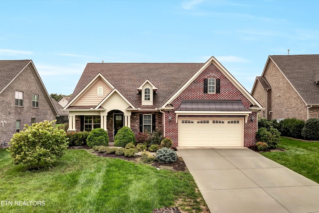 view of front of house featuring a front lawn and a garage