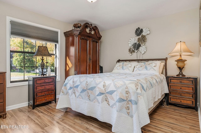 bedroom featuring light wood-type flooring