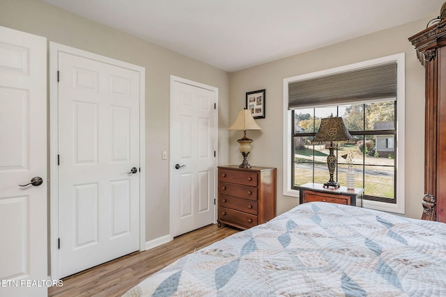 bedroom featuring light hardwood / wood-style flooring