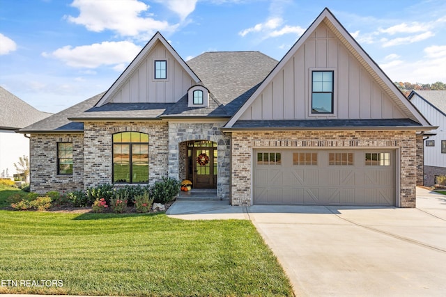 view of front facade featuring a garage and a front lawn