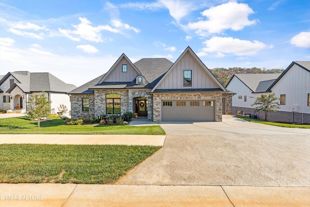 view of front of house with a front lawn and a garage