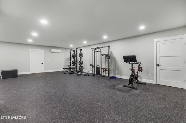 exercise room with an AC wall unit