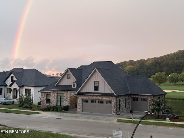 view of front of property featuring a garage