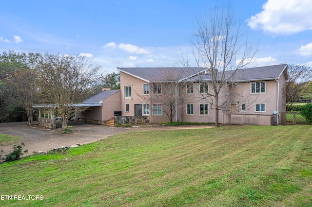 view of front of property with a front lawn