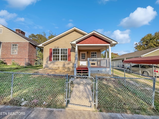 bungalow with a front yard