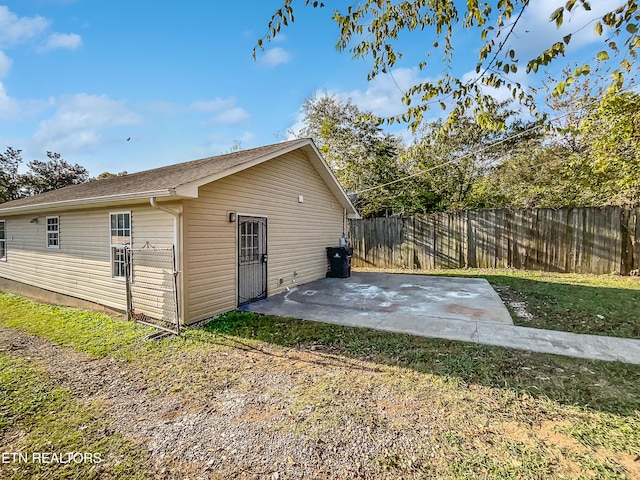 view of outbuilding featuring a yard