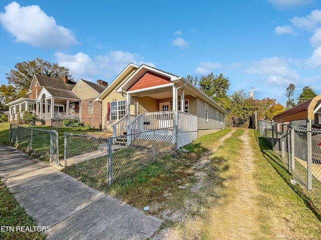 view of front of property featuring covered porch