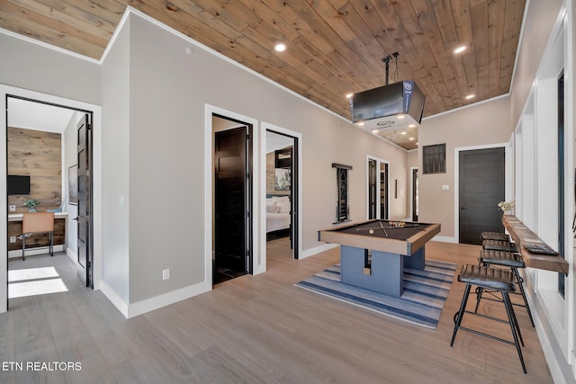 game room with light hardwood / wood-style flooring, wood ceiling, and billiards