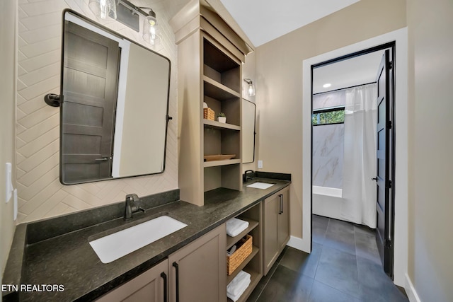 bathroom with vanity, tile patterned flooring, and walk in shower