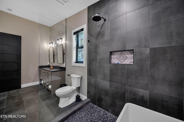 full bathroom with vanity, toilet, tile patterned floors, and separate shower and tub