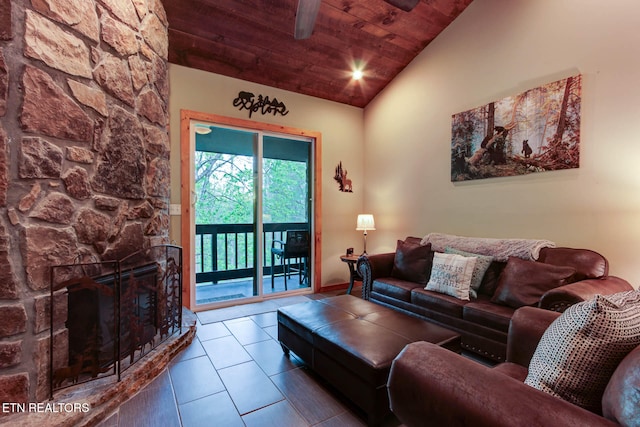 tiled living room featuring high vaulted ceiling, wooden ceiling, and a fireplace