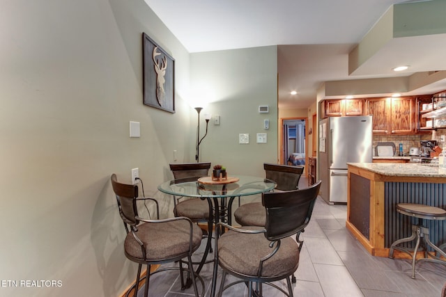 view of tiled dining area