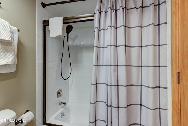 bathroom featuring shower / bath combination with curtain