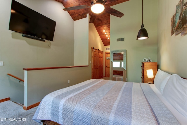 bedroom with a barn door, ceiling fan, wooden ceiling, high vaulted ceiling, and carpet