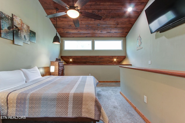 carpeted bedroom featuring wood ceiling, ceiling fan, and vaulted ceiling