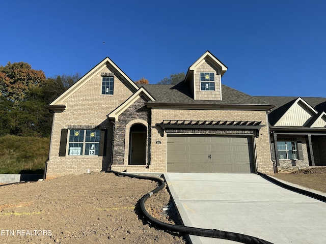 view of front of property featuring a garage