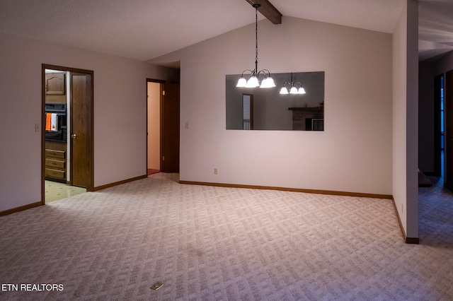 carpeted spare room with a chandelier and lofted ceiling with beams