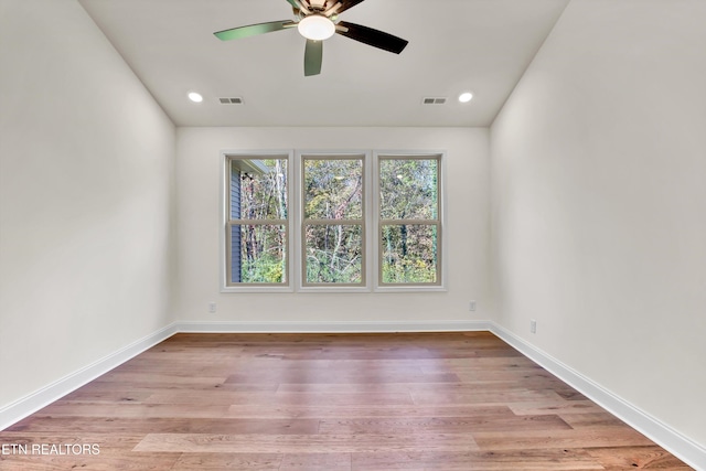 unfurnished room with light hardwood / wood-style floors and ceiling fan