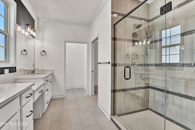 bathroom with vanity, a shower with shower door, ornamental molding, and tile patterned flooring