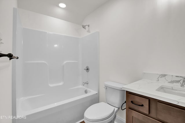 full bathroom featuring vanity, toilet, and shower / bath combination