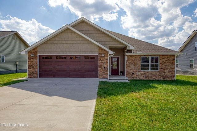 view of front of home featuring a front yard and a garage