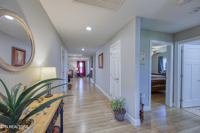 hall featuring light hardwood / wood-style flooring