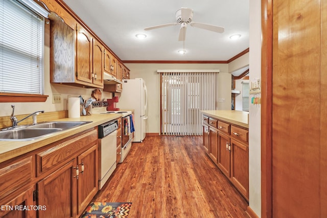 110 Trafalgar Dr, Fairfield Glade, TN 38558 - kitchen featuring ornamental molding, white appliances, ceiling fan, light countertops, and a sink