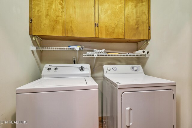 110 Trafalgar Dr, Fairfield Glade, TN 38558 - laundry area featuring cabinet space and washer and dryer