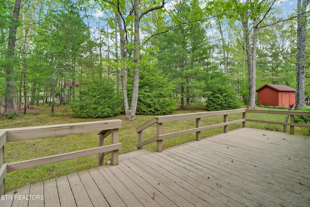 110 Trafalgar Dr, Fairfield Glade, TN 38558 - wooden deck featuring a storage shed and an outdoor structure