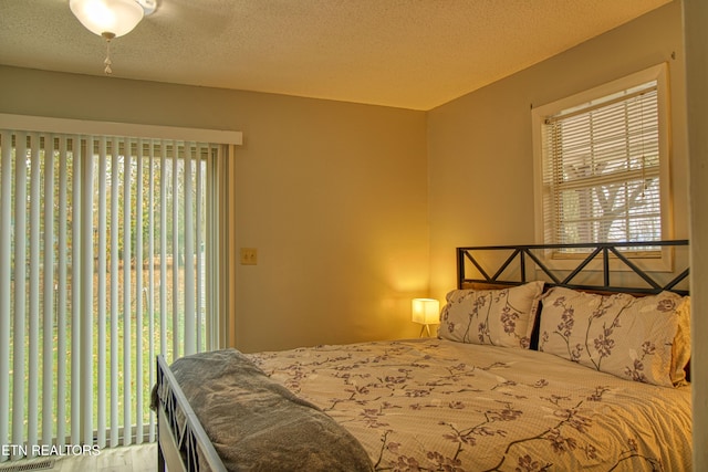 bedroom with a textured ceiling