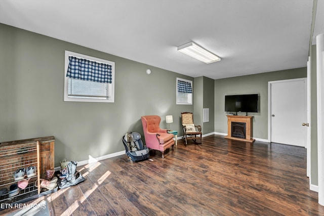 living area featuring dark hardwood / wood-style floors