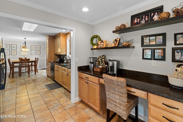 kitchen with sink, crown molding, light tile patterned floors, and pendant lighting