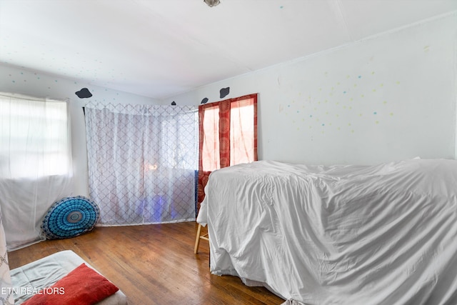 bedroom featuring hardwood / wood-style floors