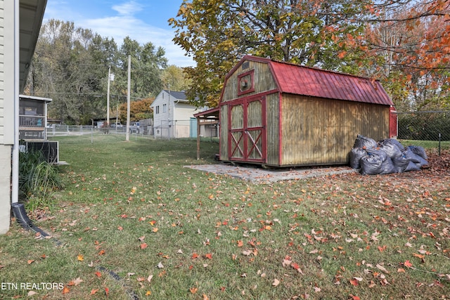 view of yard with a storage shed