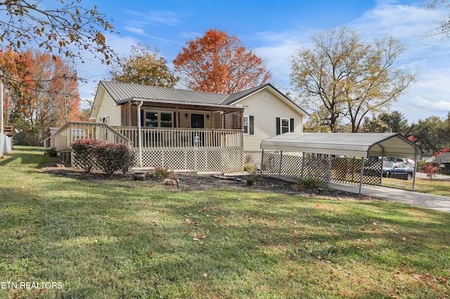 view of front of home with a porch, a front yard, a deck, and a carport