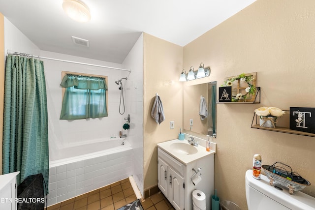 full bathroom with toilet, tile patterned floors, shower / tub combo with curtain, and vanity