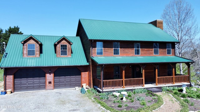 view of front facade featuring a garage and a porch