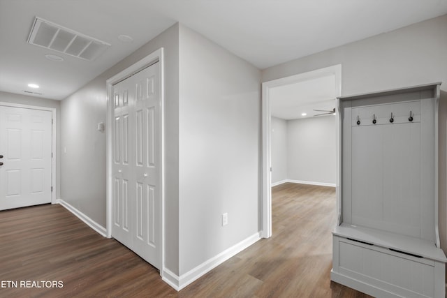 hallway featuring hardwood / wood-style flooring