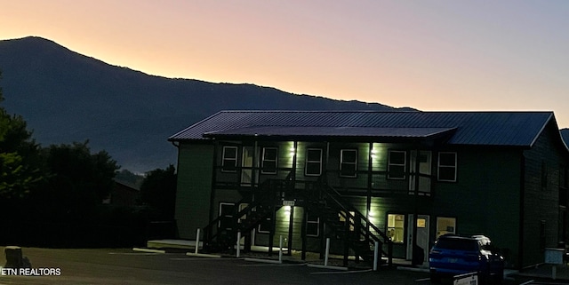 view of front facade featuring a mountain view