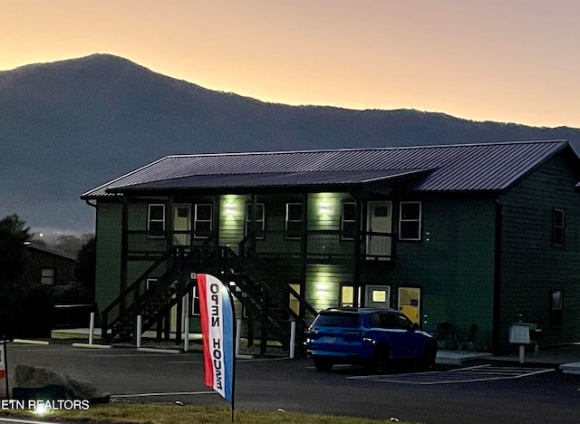 view of front of home featuring a mountain view