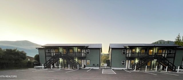 outdoor building at dusk featuring a mountain view