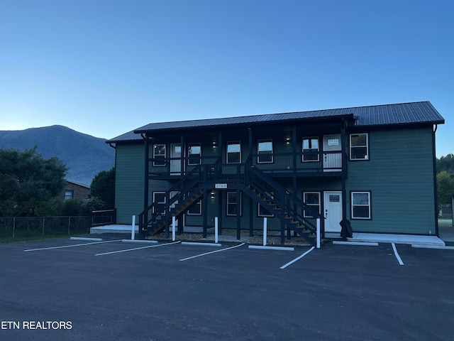 view of building exterior featuring a mountain view