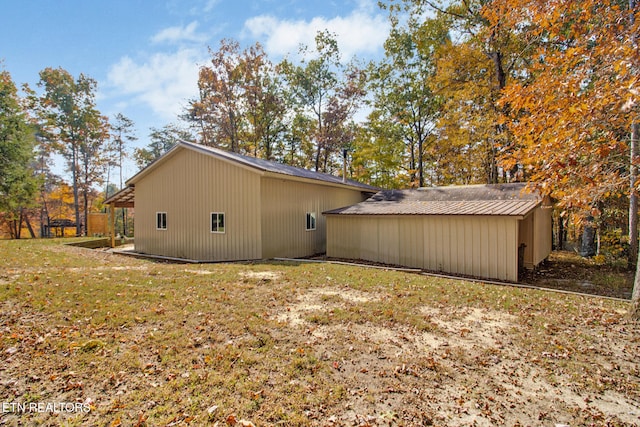 view of property exterior featuring a yard