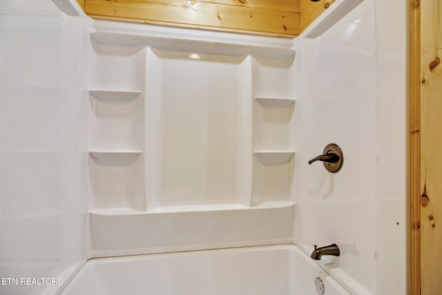 bathroom with shower / tub combination