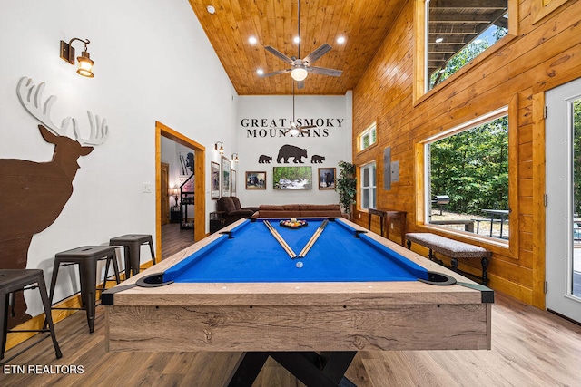 recreation room with hardwood / wood-style flooring, high vaulted ceiling, wood ceiling, and billiards