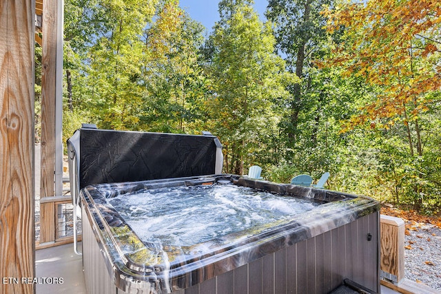 exterior space with a jacuzzi