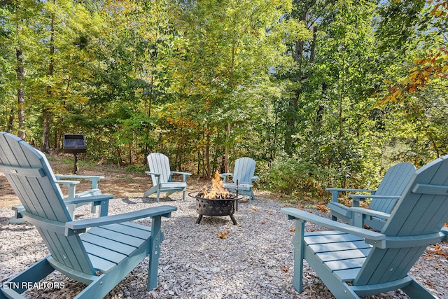 view of patio / terrace with a fire pit