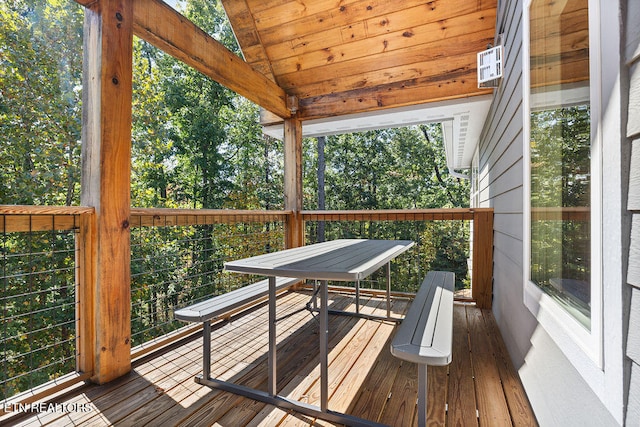 sunroom / solarium with wooden ceiling and vaulted ceiling